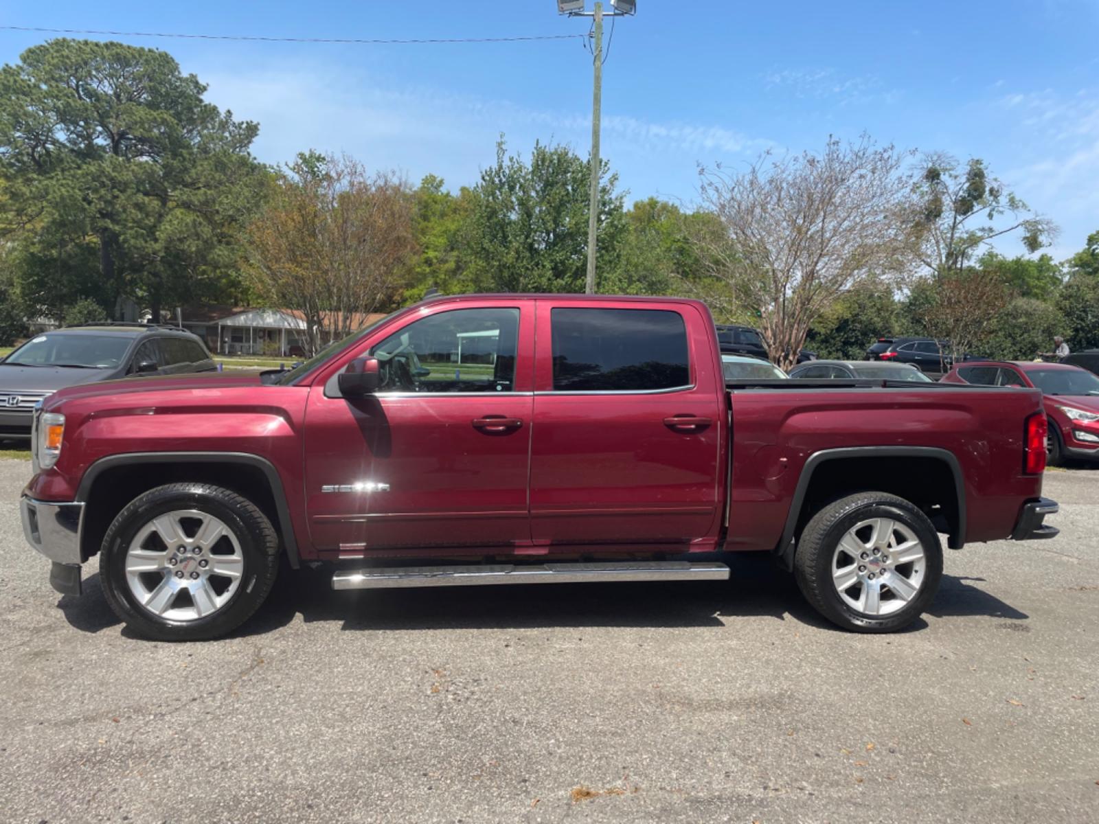 2014 RED GMC SIERRA 1500 SLE (3GTP1UEC5EG) with an 5.3L engine, Automatic transmission, located at 5103 Dorchester Rd., Charleston, SC, 29418-5607, (843) 767-1122, 36.245171, -115.228050 - Comfortable Interior with AUX/Bluetooth/Pandora, OnStar, Backup Camera, Dual Climate Control, Power Everything (windows, locks, seats, mirrors), Keyless Entry, Bed Liner, Running Boards, Tow Package, Alloy Wheels. Local Trade-in!! 195k miles Located at New Life Auto Sales! 2023 WINNER for Post & Co - Photo #3